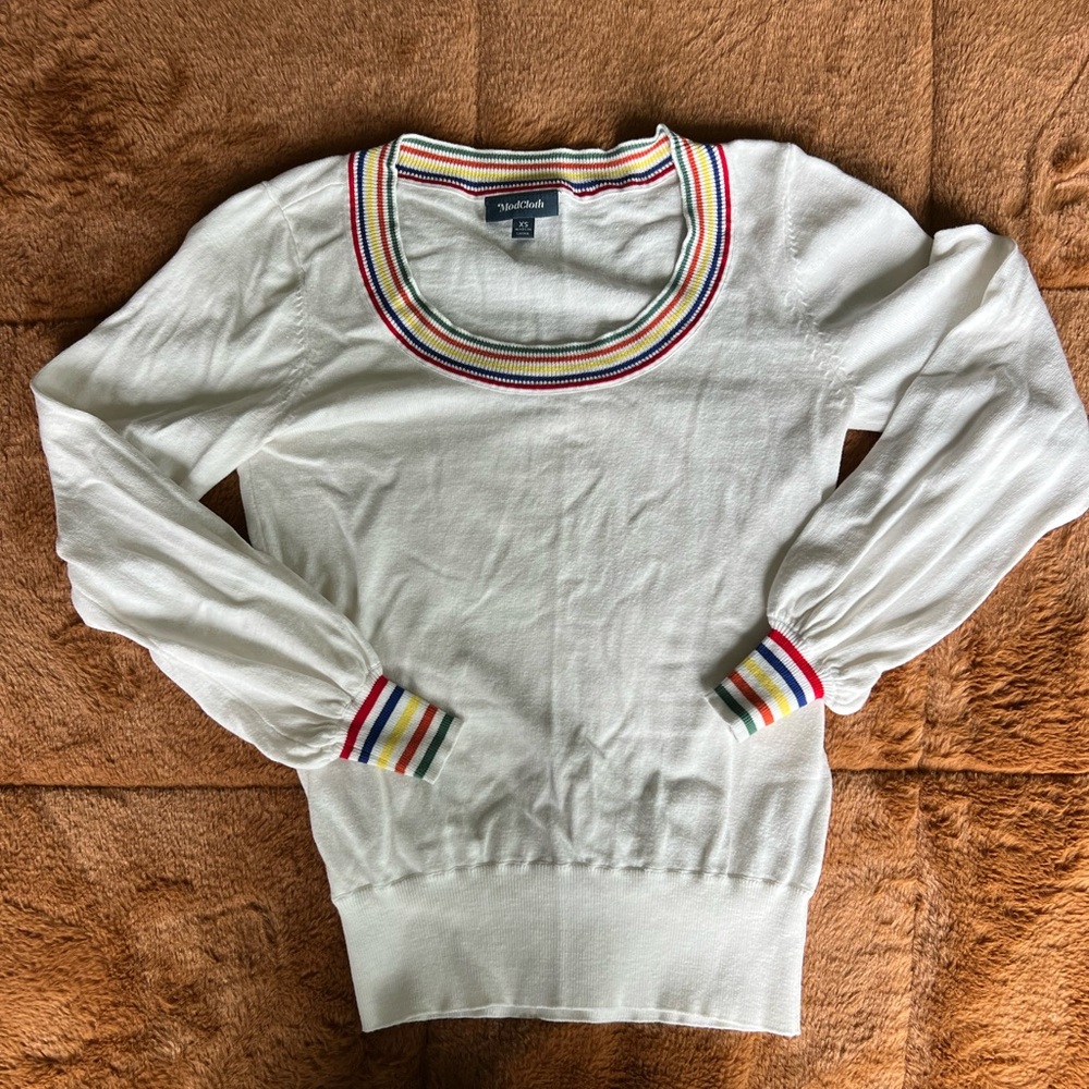 Adorable Mod Cloth white sweater with rainbow trim